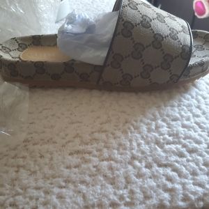 Gucci GG canvas slide sandal